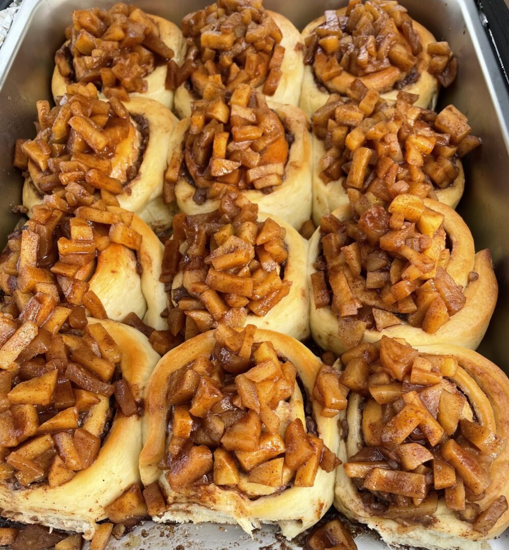 Freshly made sandwiches with sautéed mushrooms on soft buns.